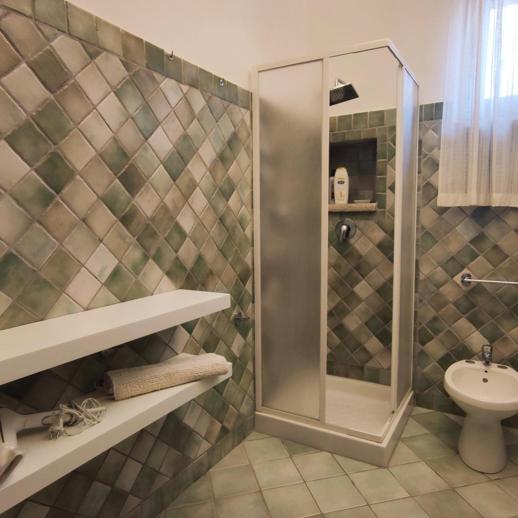 Mama Babylon Hotel Olbia Bagian luar foto
